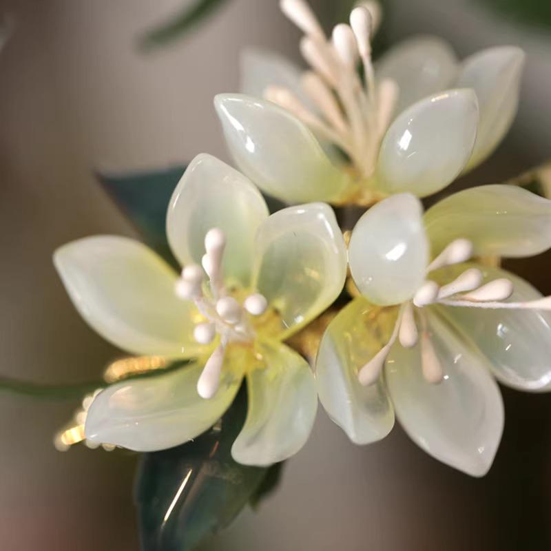 Close-up of a light green flower with a blurred background