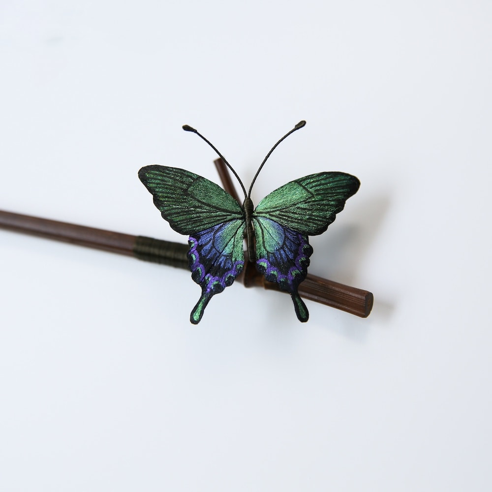 Close up of the mulberry silk velvet butterfly wing on bamboo hair stick for hanfu