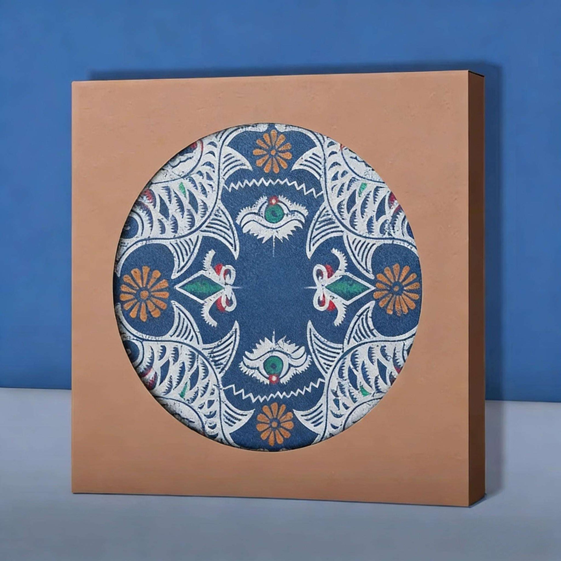 Decorative coaster  box with a colorful circular coaster on a blue background