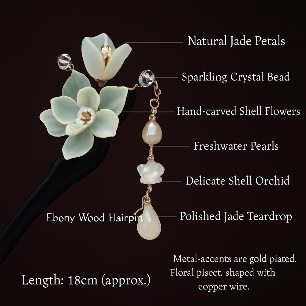 Detailed description of a hairpin with natural jade petals, sparkling crystal bead, hand-carved shell flowers, freshwater pearls, and polished jade teardrop on a black background.