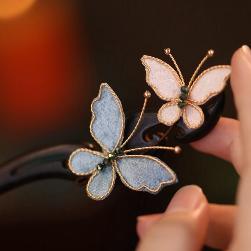 Detailed view of silk mesh butterfly wings and golden copper hanfu hair pin 