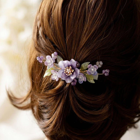 Purple Peony Ronghua Velvet Flower Hair Clip in a person's hair with a blurred background