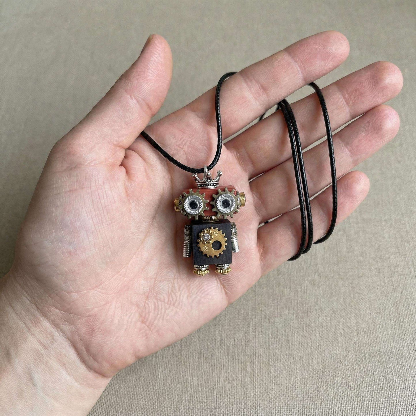Handmade Steampunk Robot Pendant with Recycled Metal Gears and Springs.