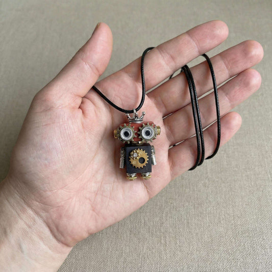 Handmade Steampunk Robot Pendant with Recycled Metal Gears and Springs.