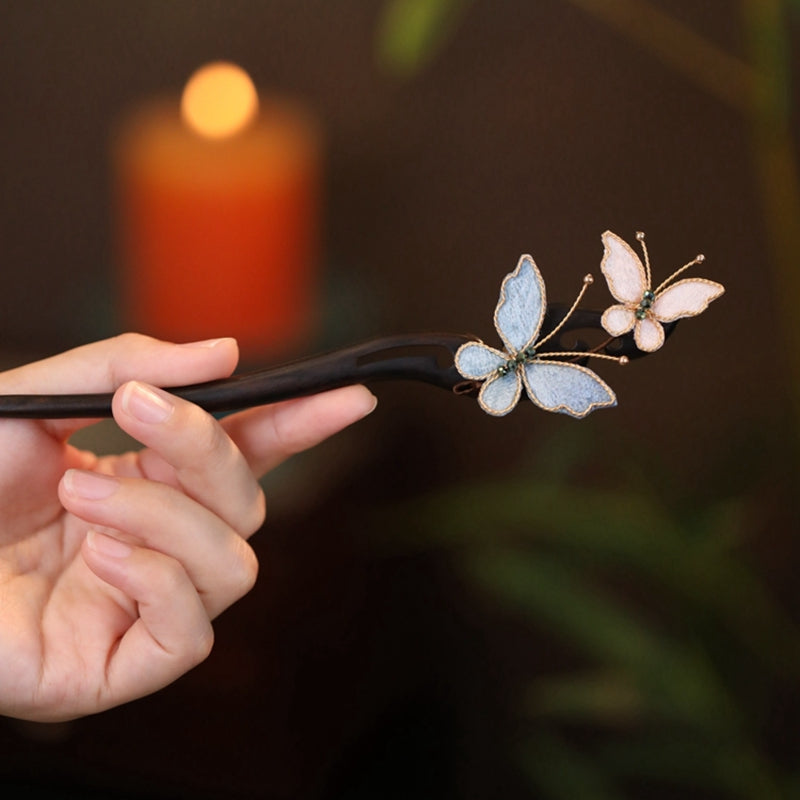 Vintage butterfly hair stick set on a neutral background for hair styling inspiration