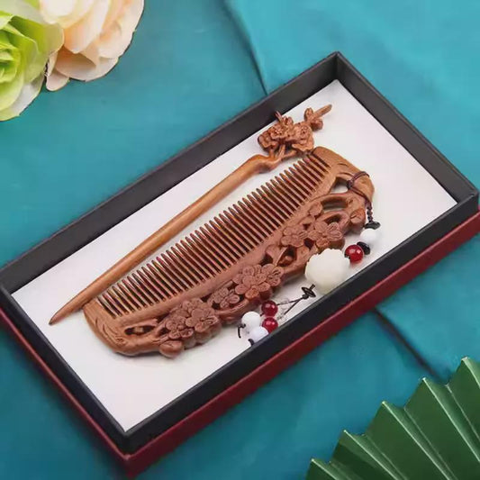 Wooden comb and hair pin set on a white tray with a blue background