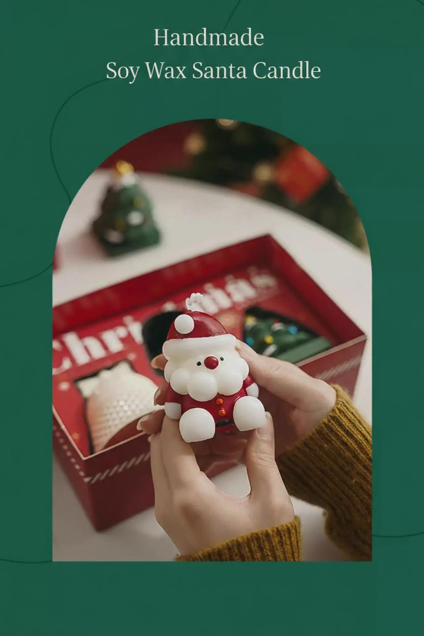 Handmade soy wax Santa candle held by a person with a Christmas-themed gift box in the background.