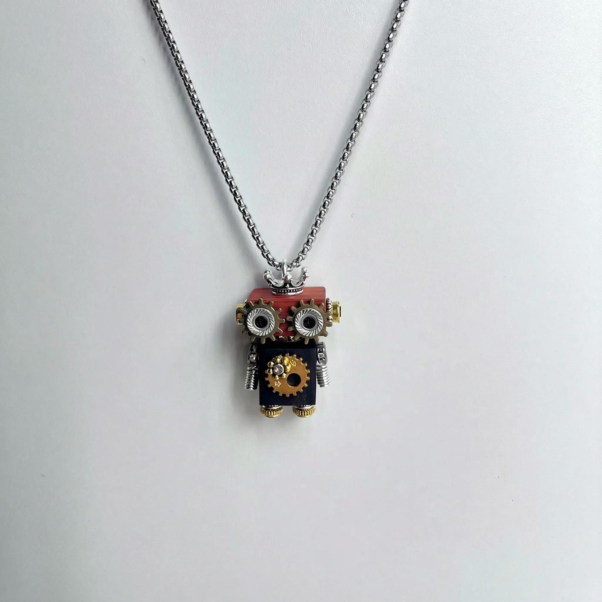 Necklace with a robot pendant on a white background